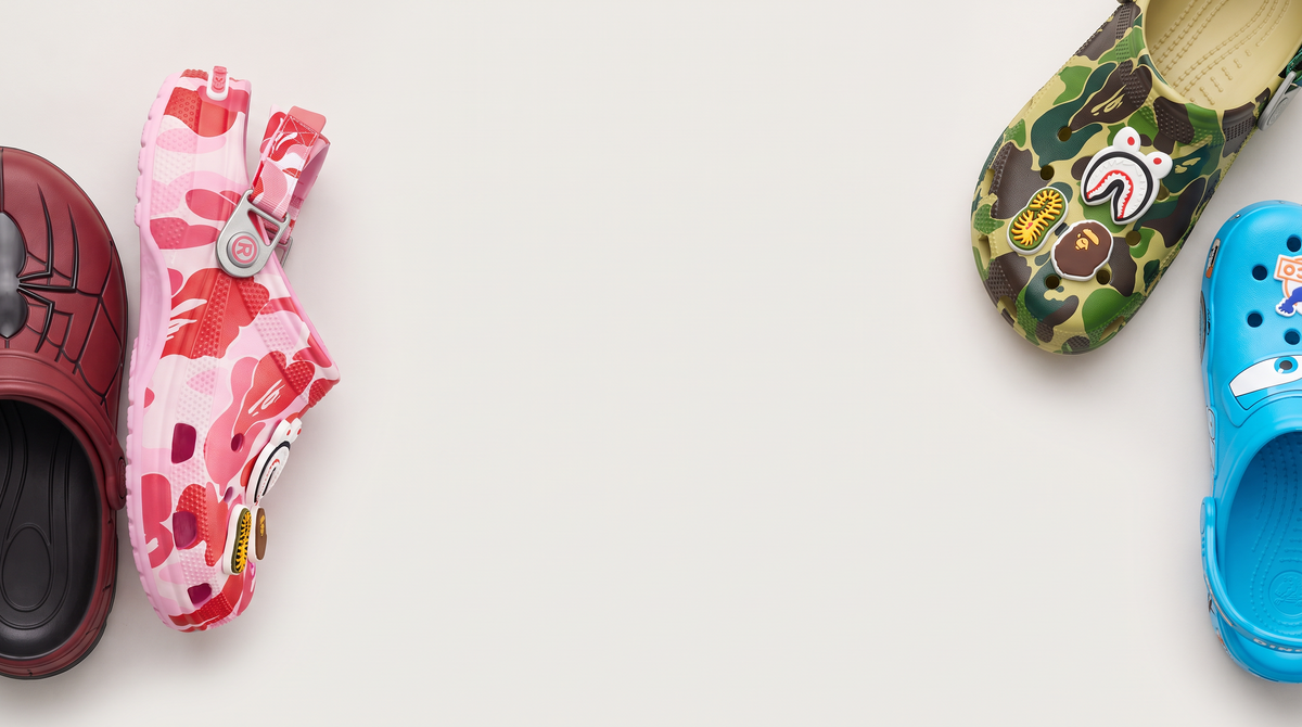 SYDZ foam clogs — red, pink camo, green camo and blue — on a light studio backdrop