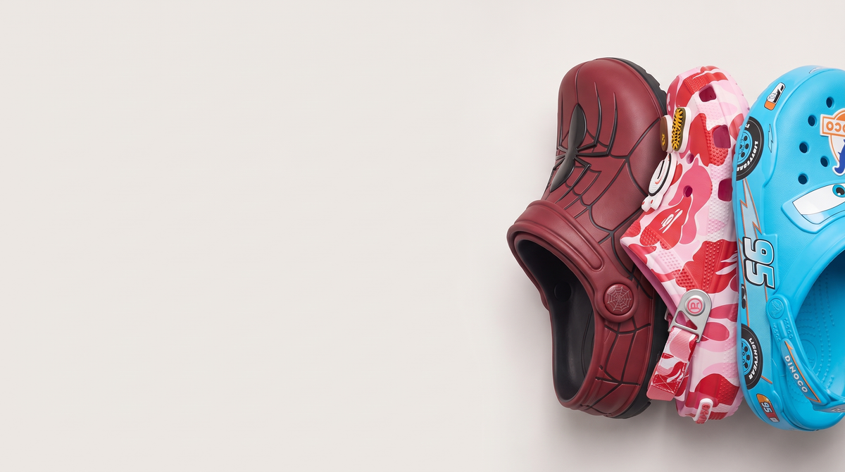 SYDZ foam clogs on a light studio backdrop